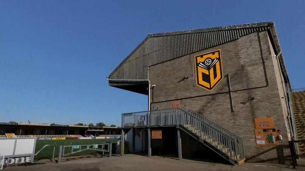 Image of crest on football stand