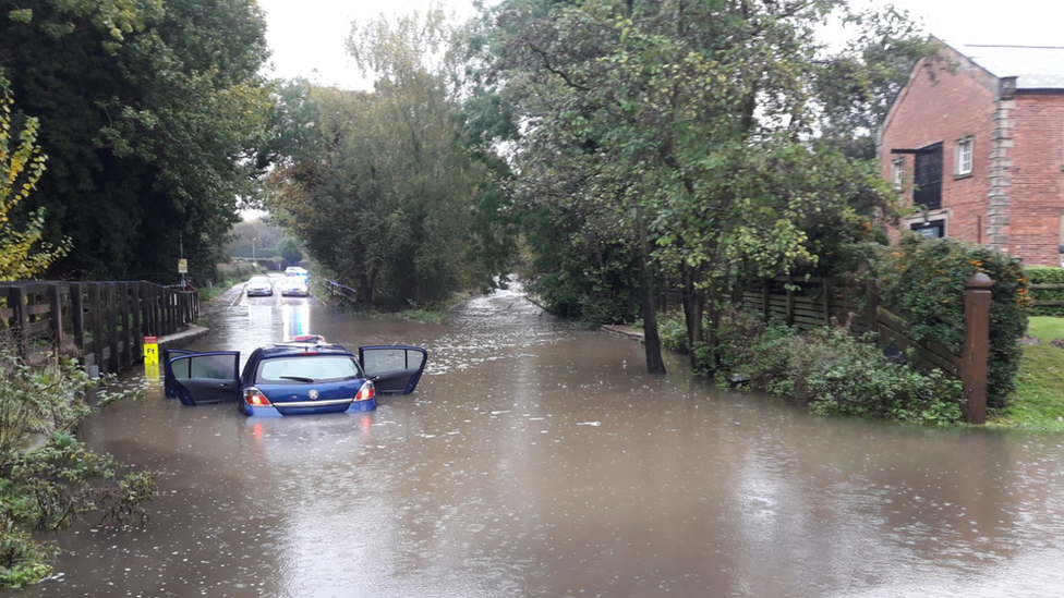 Car stuck in flood water