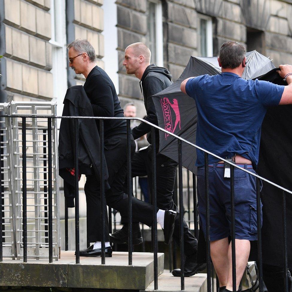 Robert Carlyle is shielded by film crew in Edinburgh