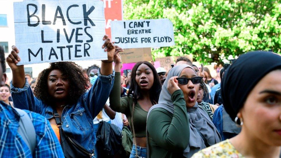 People attend a Black Lives Matter march, in solidarity with protests raging across the United States over the death of George Floyd, in Aarhus, Denmark June 3, 2020