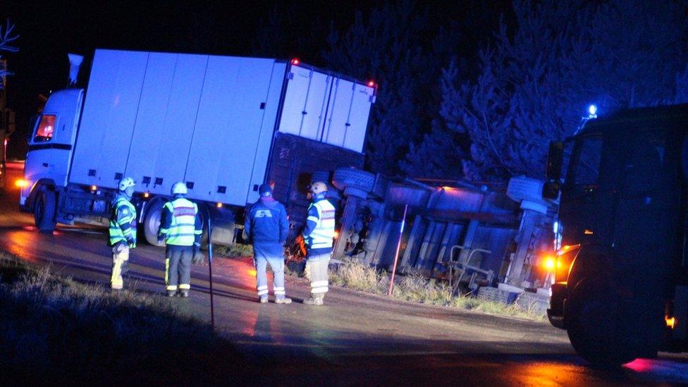 Lorry sheds meatball load near Skara in Sweden, November 2017