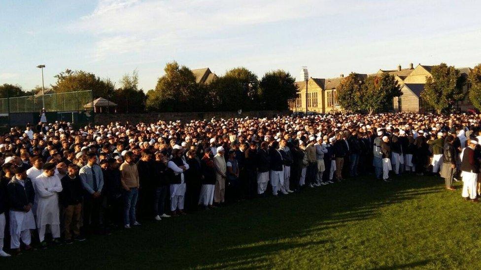 Mourners at Asad Khan's funeral