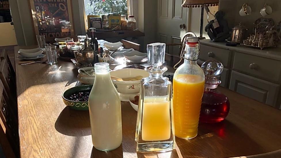 Juice and milk on a shared breakfast table at Ellesmere House B&B