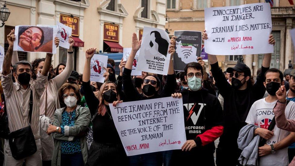 People gather in protest against the death of Mahsa Amini on September 24, 2022 in Rome, Italy