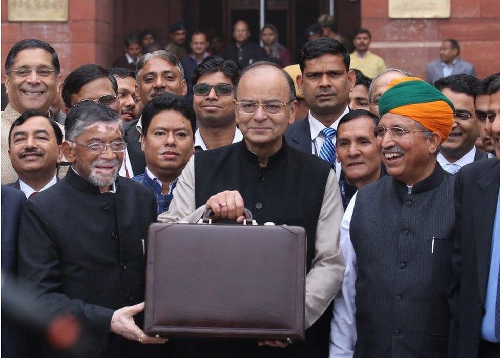 ndian Finance Minister Arun Jaitley (C) holds his briefcase with Union Budget documents as he leaves the Ministry of Finance for the Parliament House to present the 2017-18 General Budget in New Delhi, India, 01 February 2017.