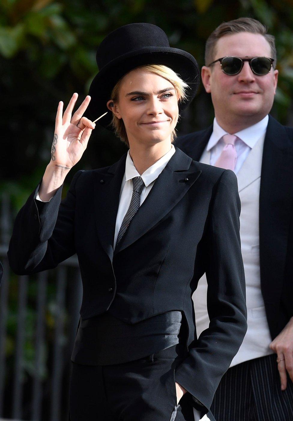 British model and actress Cara Delevingne arrives for the royal wedding ceremony