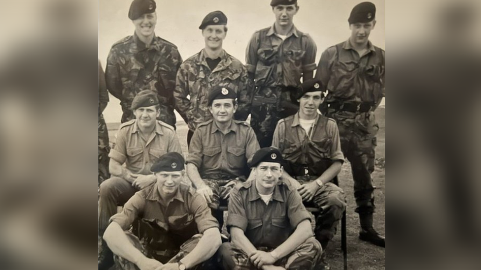 Group of men in Navy uniforms 