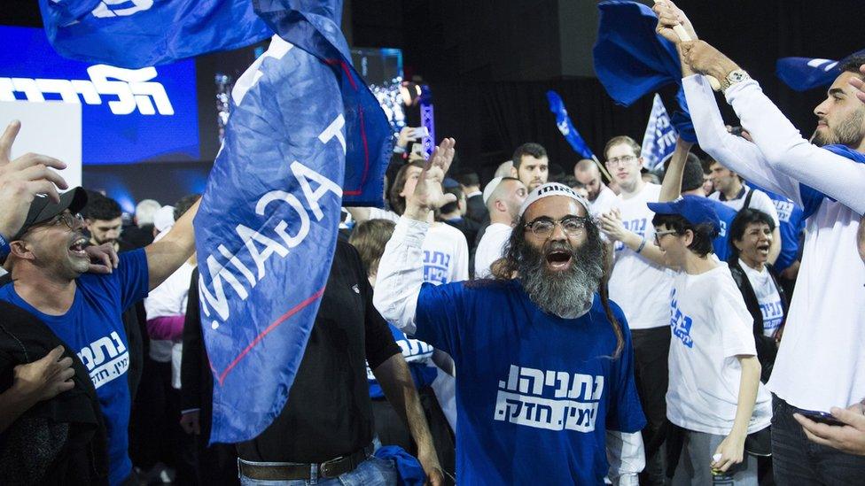 Likud supporters celebrate at the party's headquarters in Tel Aviv on 10 April 2019