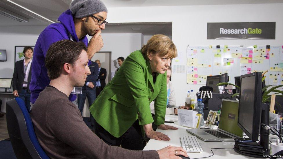 German Chancellor Angela Merkel visiting start up internet companies in Berlin