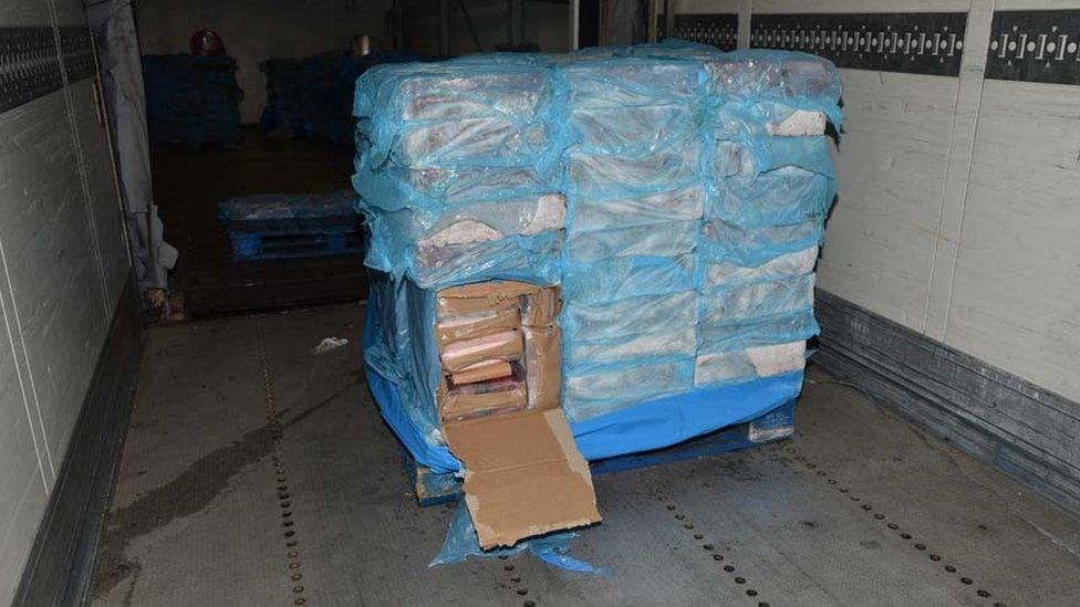 A pallet with a box containing cocaine