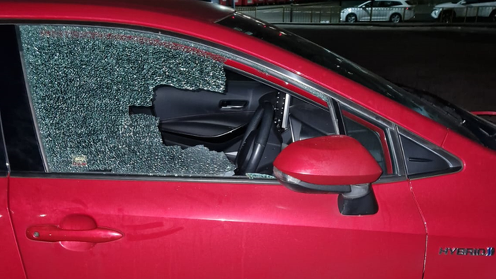 The car's smashed window