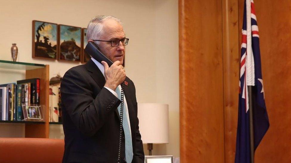 Australian Prime Minister Malcolm Turnbull talks to US President-elect Donald Trump