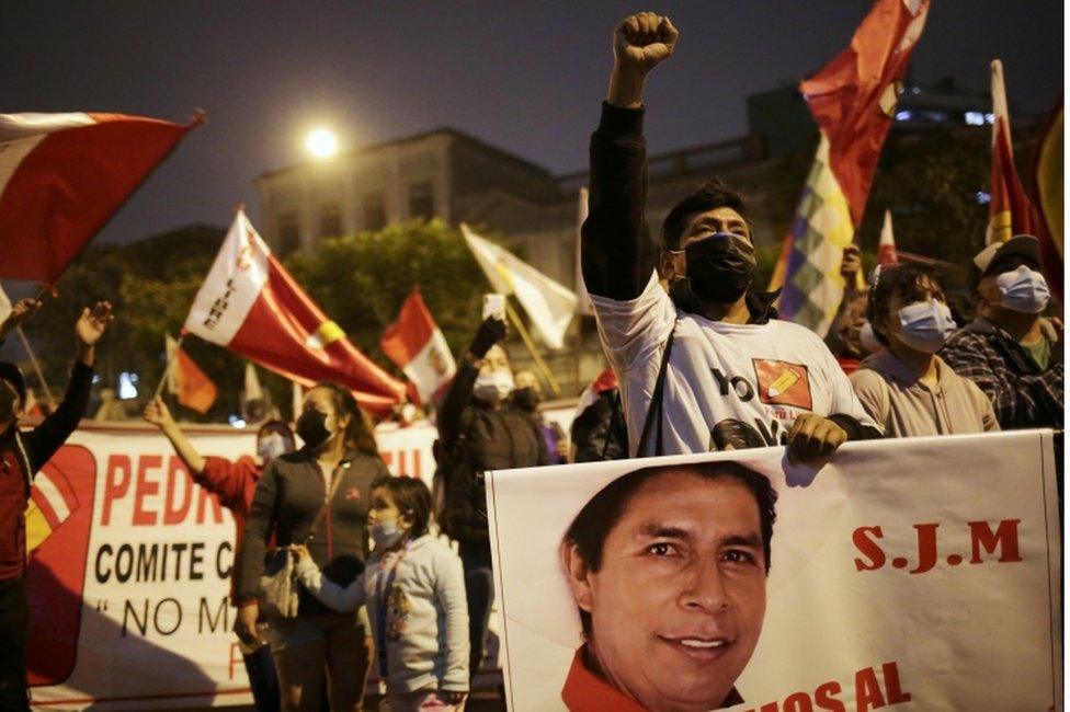 Supporters of Peru's presidential candidate Pedro Castillo gather on a street the day after a run-off election, in Lima, Peru June 7, 2021