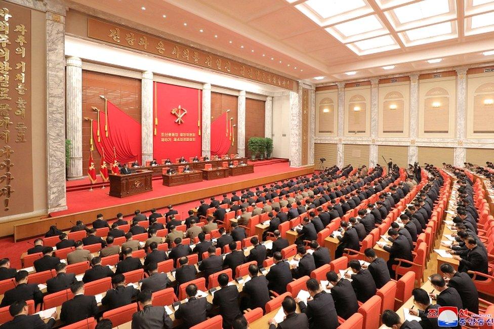 North Korean leader Kim Jong-un chairs a session of the 4th plenary meeting of the 8th Central Committee of the ruling Workers" Party, in this photo released on 29 December 2021 by North Korea's Korean Central News Agency (KCNA)