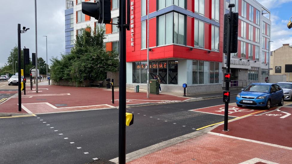 A picture of a crossing in a road