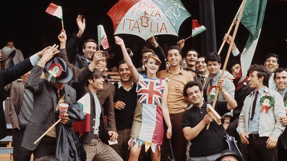 17-year-old Kathleen Riddel of Sunderland cheers on Italy with the help of some native Italian fans, as they took on the USSR at Roker Park