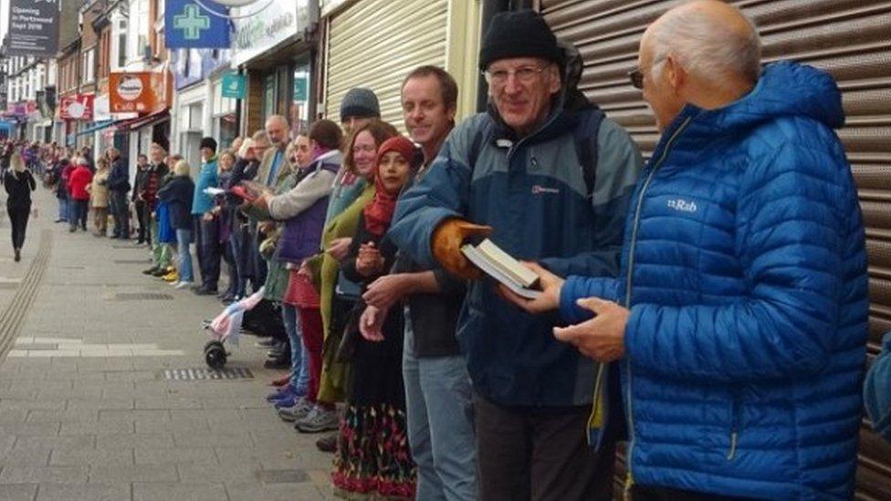 Human chain at October Books