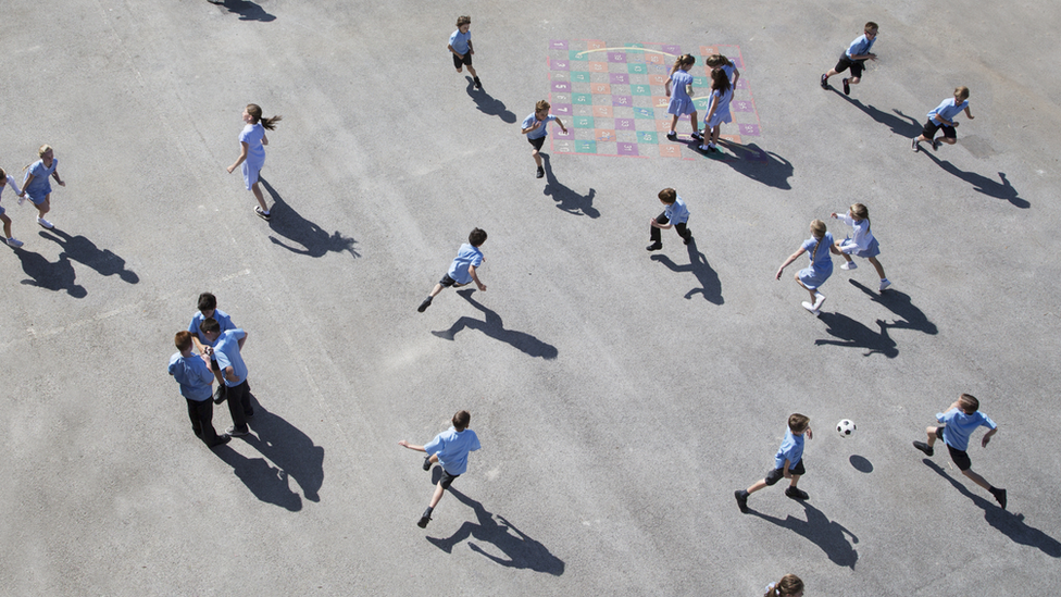 Children playing in the sunshine