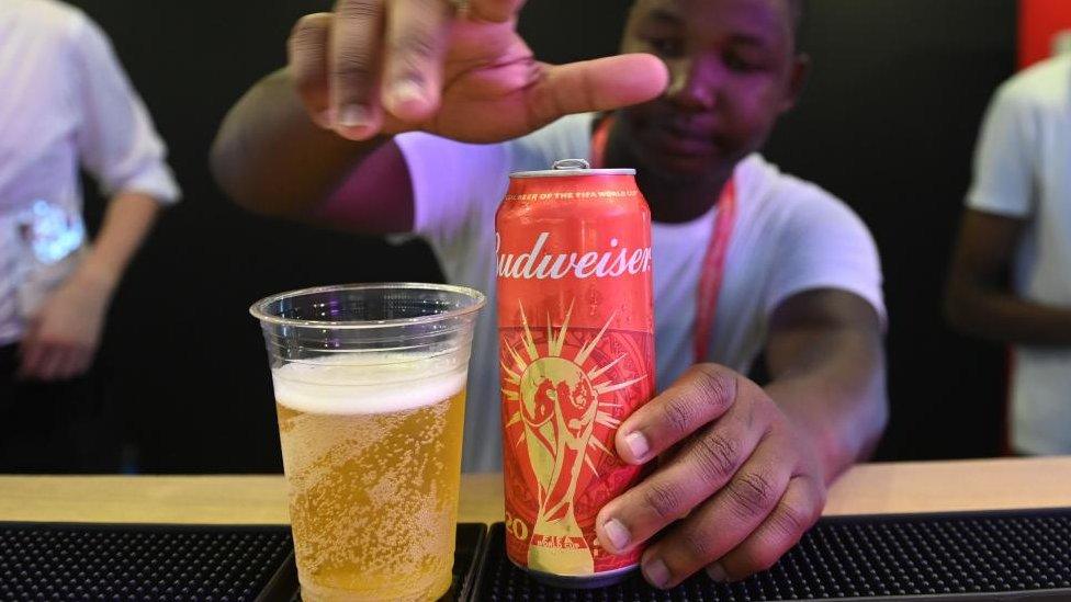 Alcohol being served at the media centre in Doha on Friday. In a now-deleted tweet, Budweiser reacted to the ban by saying: "Well, this is awkward"