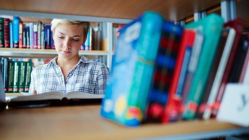 Student in library