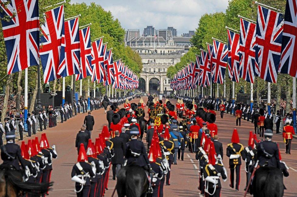 Procession as Queen's coffin is taken to Westminster