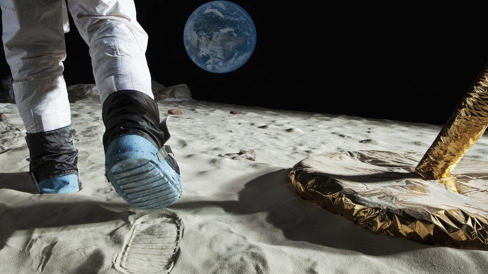 astronaut walking on the Moon