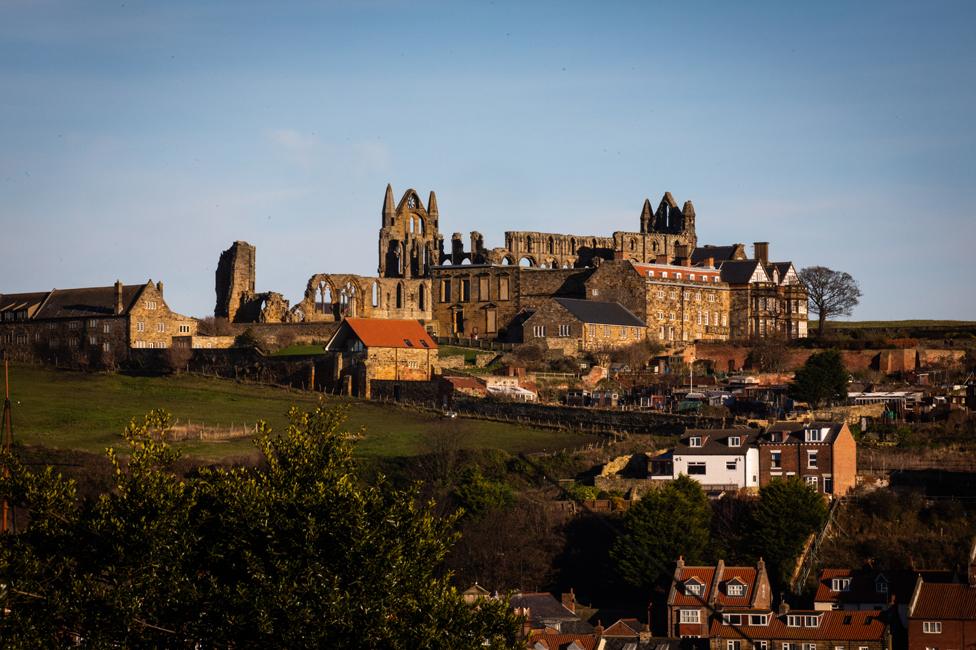 The abbey above the town