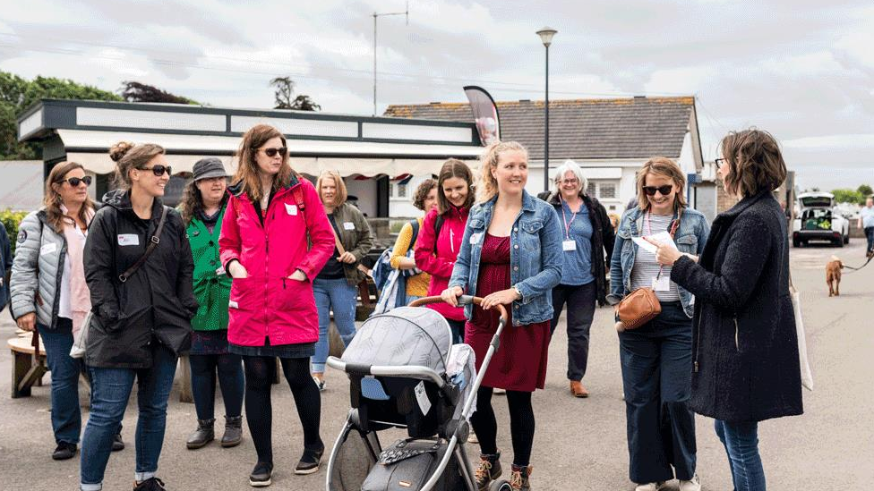 Mothers can chat and network while taking their children along