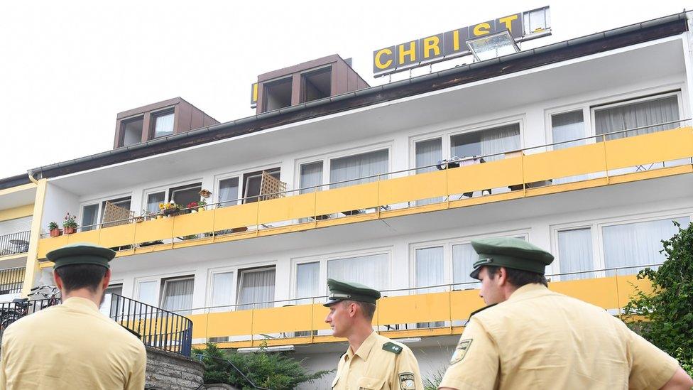 Police outside the former hotel where the bomber had lived in Ansbach, Germany, 25 July