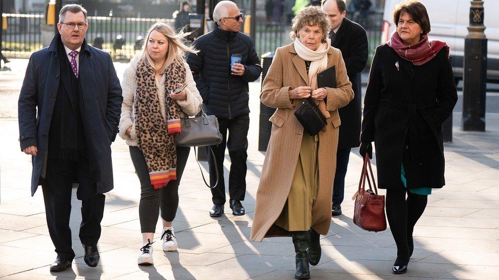 DUP leader Sir Jeffrey Donaldson (left), Baroness Kate Hoey (second right), and former first minister Dame Arlene Foster (right) outside the UK Supreme Court in London