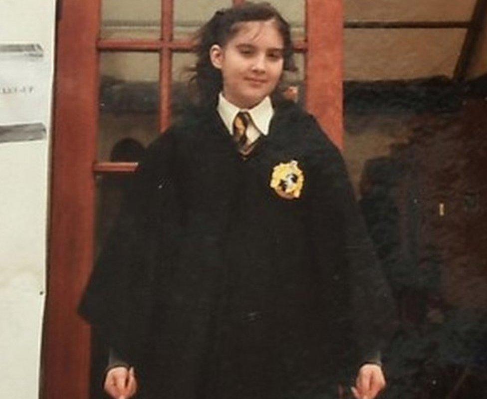 Verity Collins wearing a Hogwarts uniform