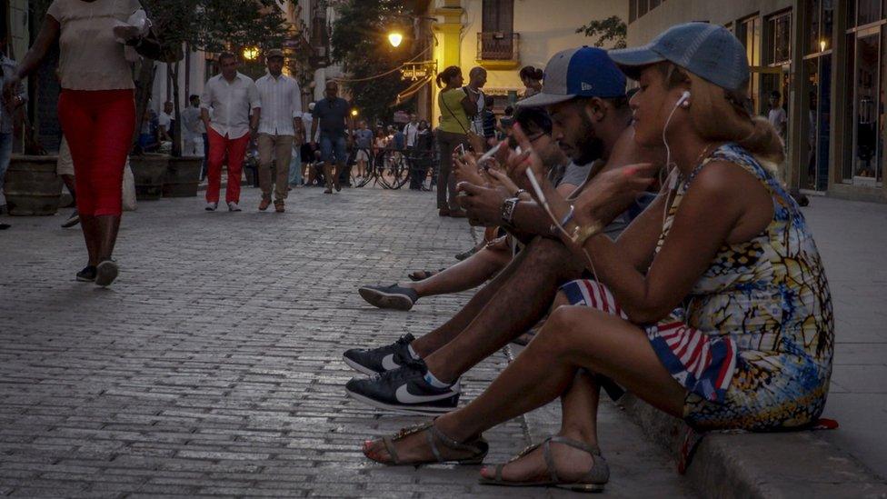 Cubans at a wi-fi hotspot