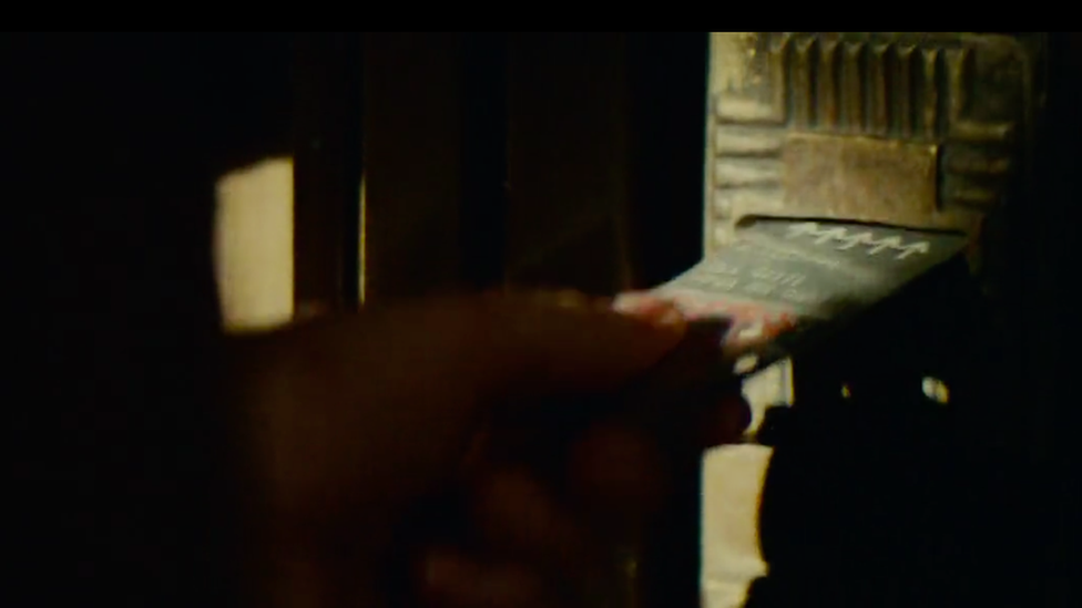 Deckard uses a key card to enter his home