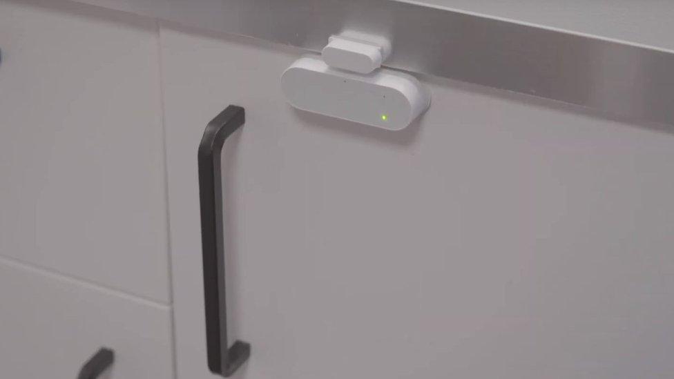 A door sensor which monitors movements in the home