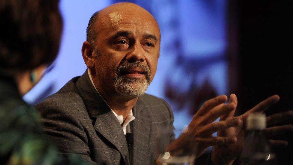 Christian Louboutin speaks at a forum on 10 November 2011