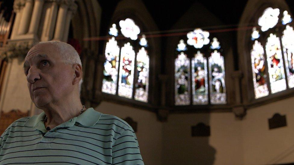 Mike Espirion pictured inside the Trinity Centre in Cardiff, where he helps other asylum seekers