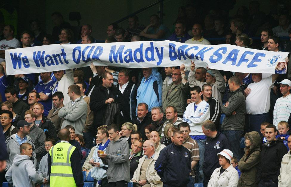 Everton fans hold a banner appealing for the safe return of Madeleine McCann prior to the Barclays Premiership match between Chelsea and Everton at Stamford Bridge on 13 May 2007 in London