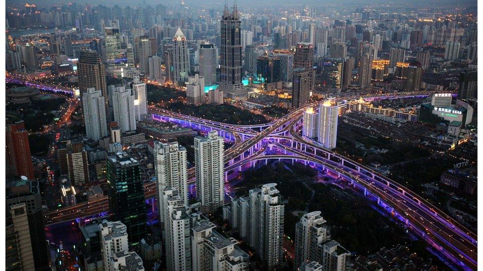 A handout picture released by the Shanghai Pacific Institute for International Strategy on April 14, 2010 and taken on March 28, 2010, shows an aerial night view of Shanghai's new financial district skyline along the Huang Pu river in Shanghai, China.