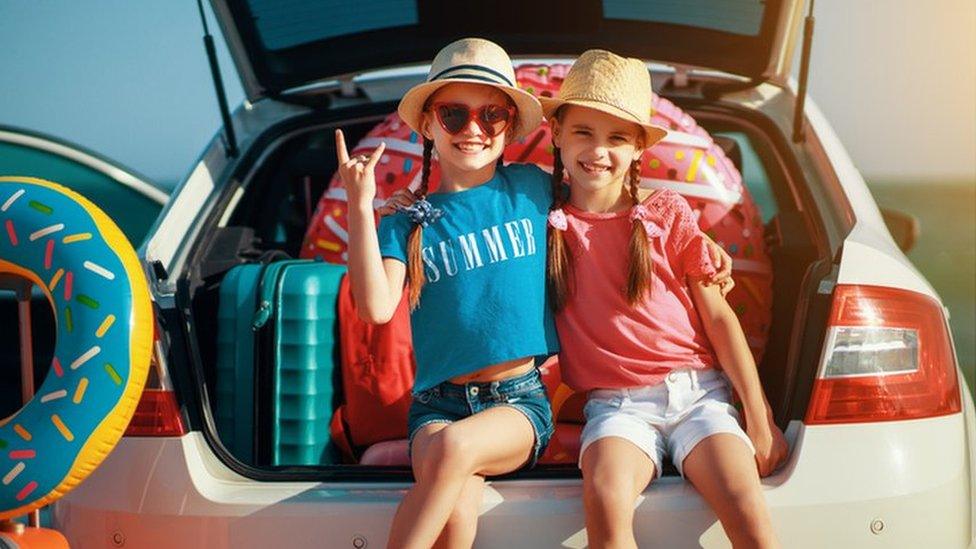 Two girls ready for a summer trip