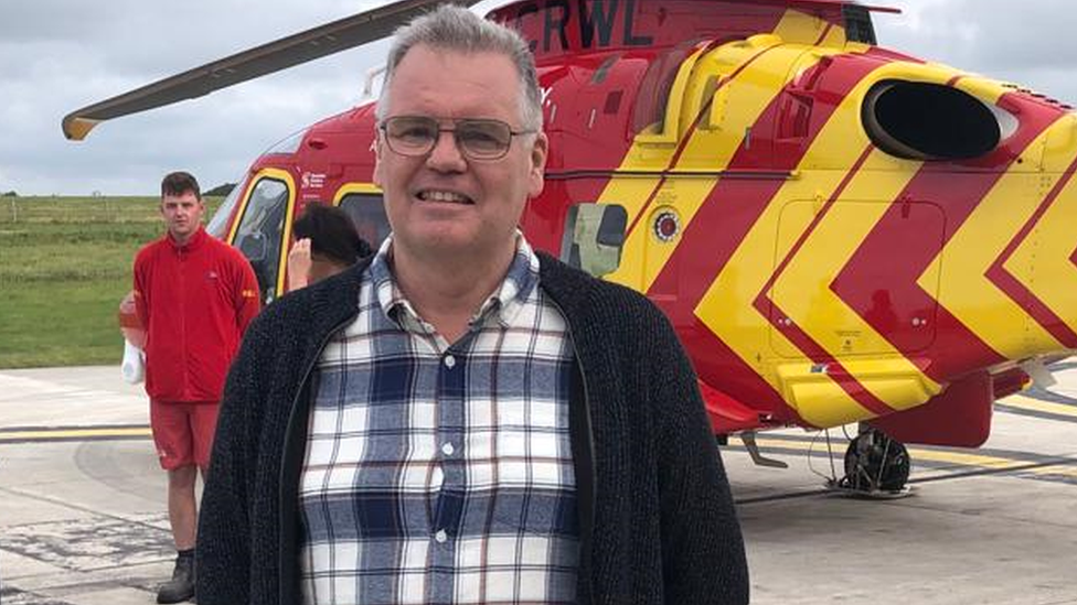 Mr Barendt in front of air ambulance