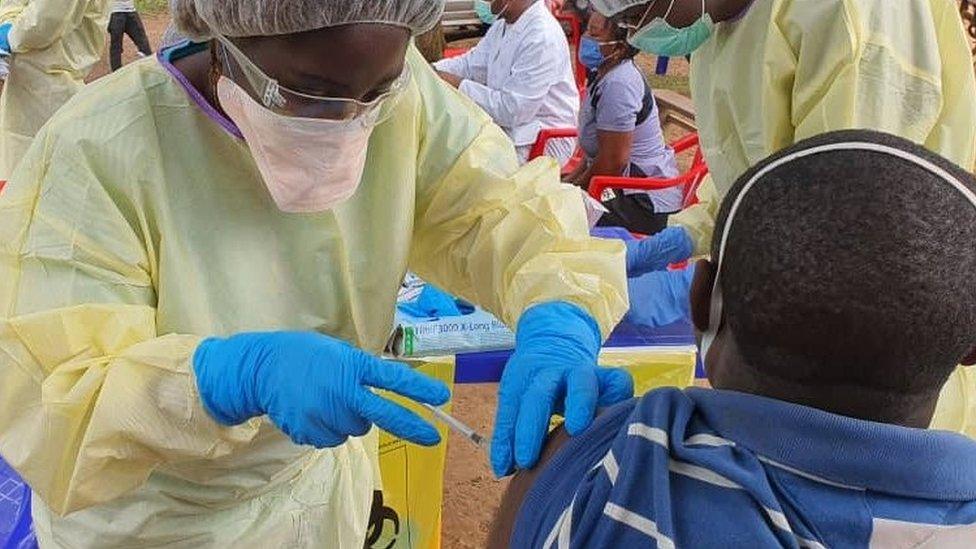 People being vaccinated in DR Congo