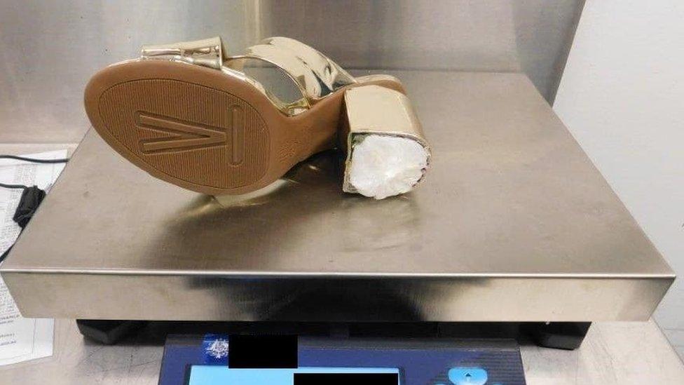 One of Woodrum's shoes on an airport scale