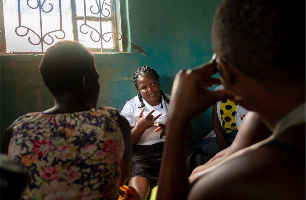 A group of women receive contraception education