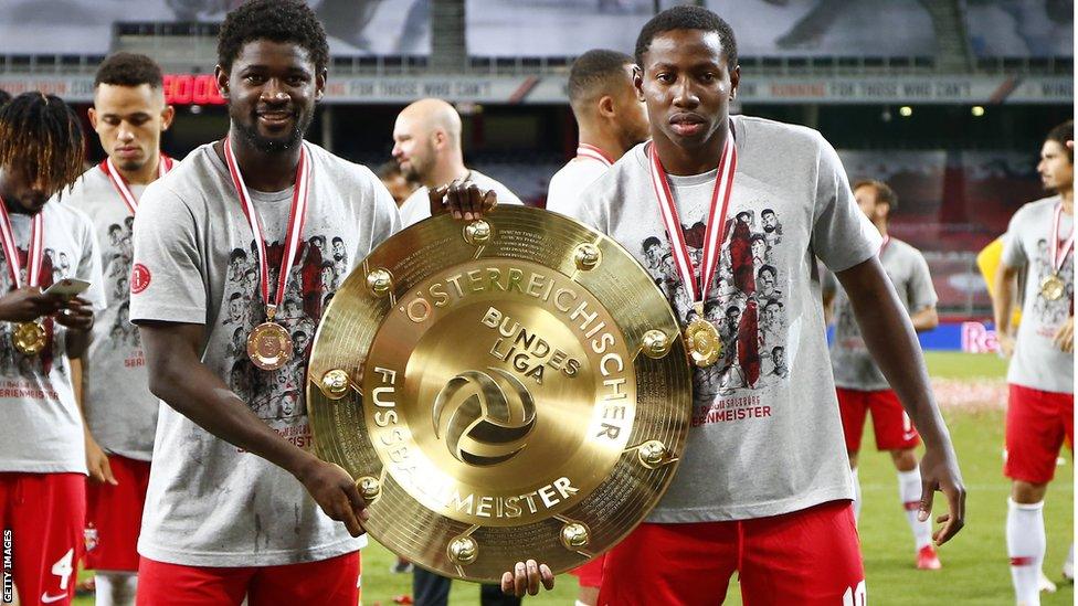 Sekou Koita (left) with Mohamed Camara with the Austrian Bundesliga trophy