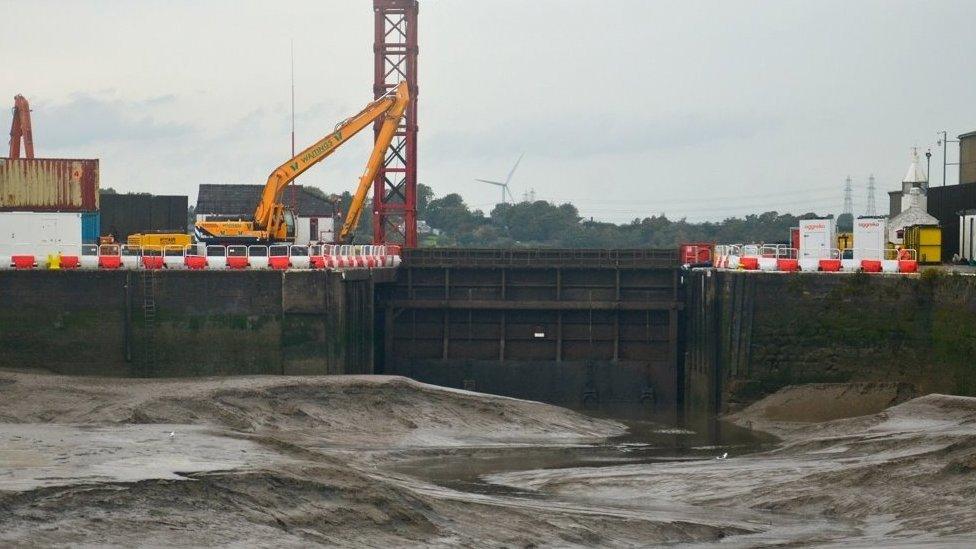 Raised broken hydraulic sea gate at Glasson Dock near Lancaster