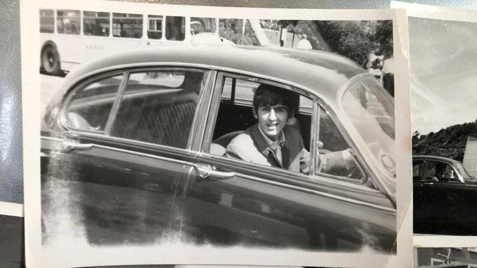 George Harrison in a car