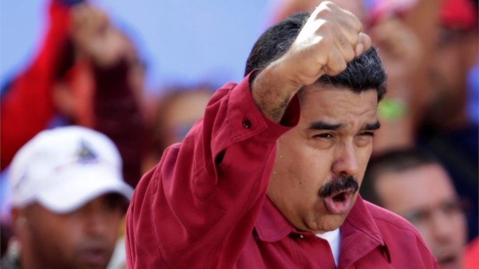 Venezuela's President Nicolas Maduro gestures during a rally against US President Donald Trump in Caracas, Venezuela, August 14, 2017.