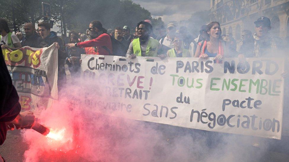 Thousands of people take to the streets during the May Day demonstrations on 1 May 2018 in Paris, France.