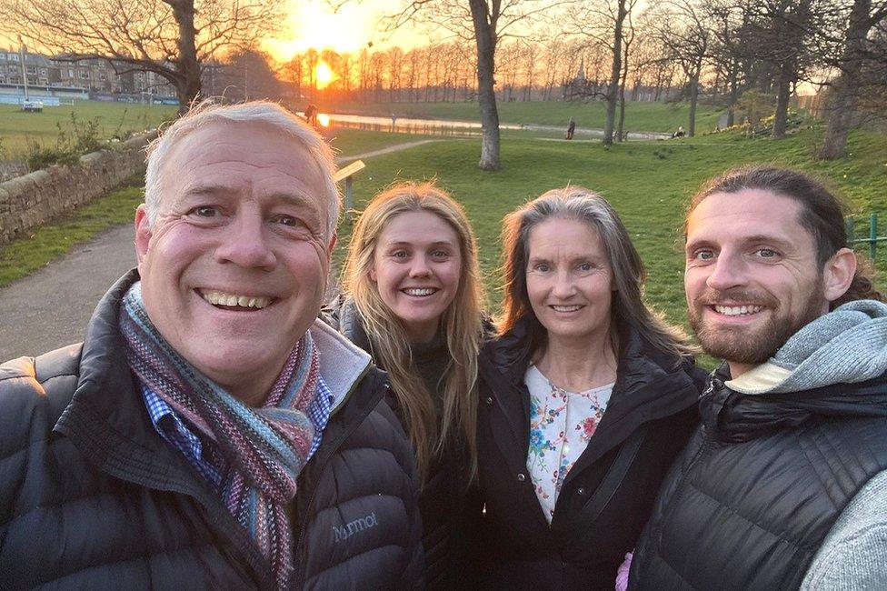 Scott Hastings with his wife and children