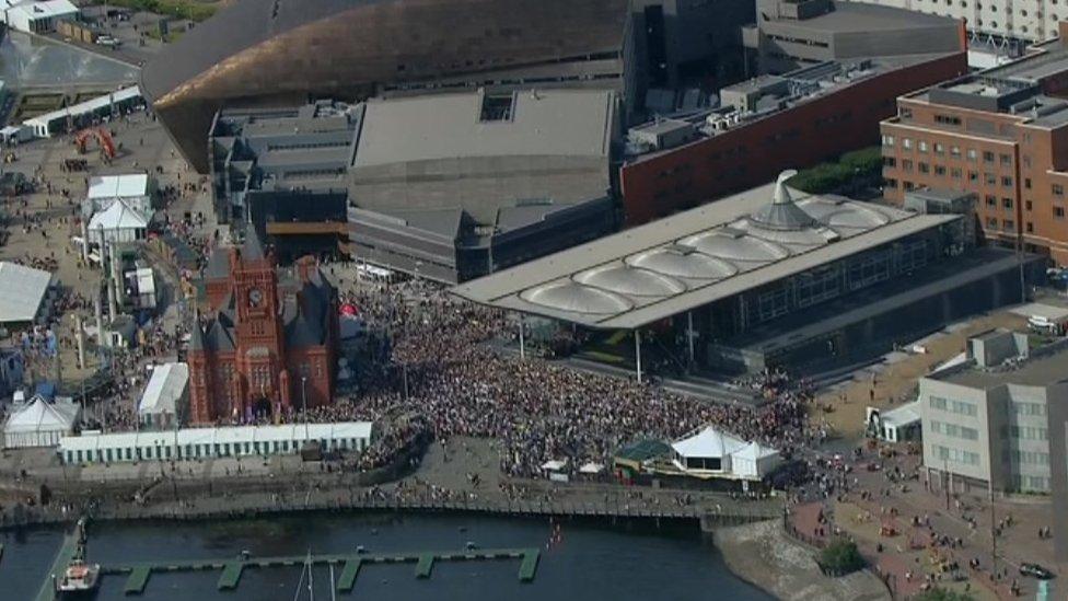 Thousands outside the Senedd in Cardiff Bay